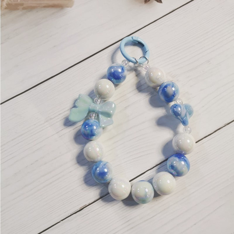 Wholesale Electroplated beaded bow car key chain mobile phone pendant cute candy color paint ring pearl accessories bag